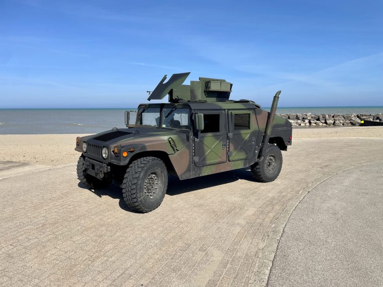 An M1043A2 slantback Humvee with a GPK turret, out by the lakefront